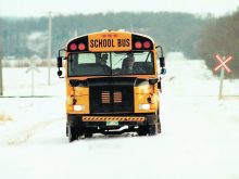 School buses are a common sight on the rural Prairies, but decades ago, many rural children arrived at school in a horse-drawn school van.  |  File photo