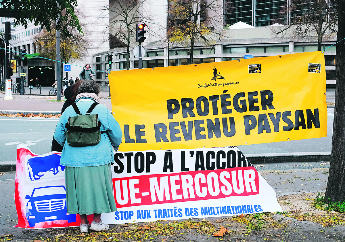 Members of the French farm group Confederation Paysanne set up in front of the Ministry of Economy in Paris last month to denounce the European Union-Mercosur trade agreement.  |  Reuters photo