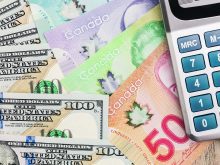 Financial institutions have projected that the U.S. dollar will stay strong in the first half of 2025, but the loonie could rebound in the last two quarters of the year. | Getty Images