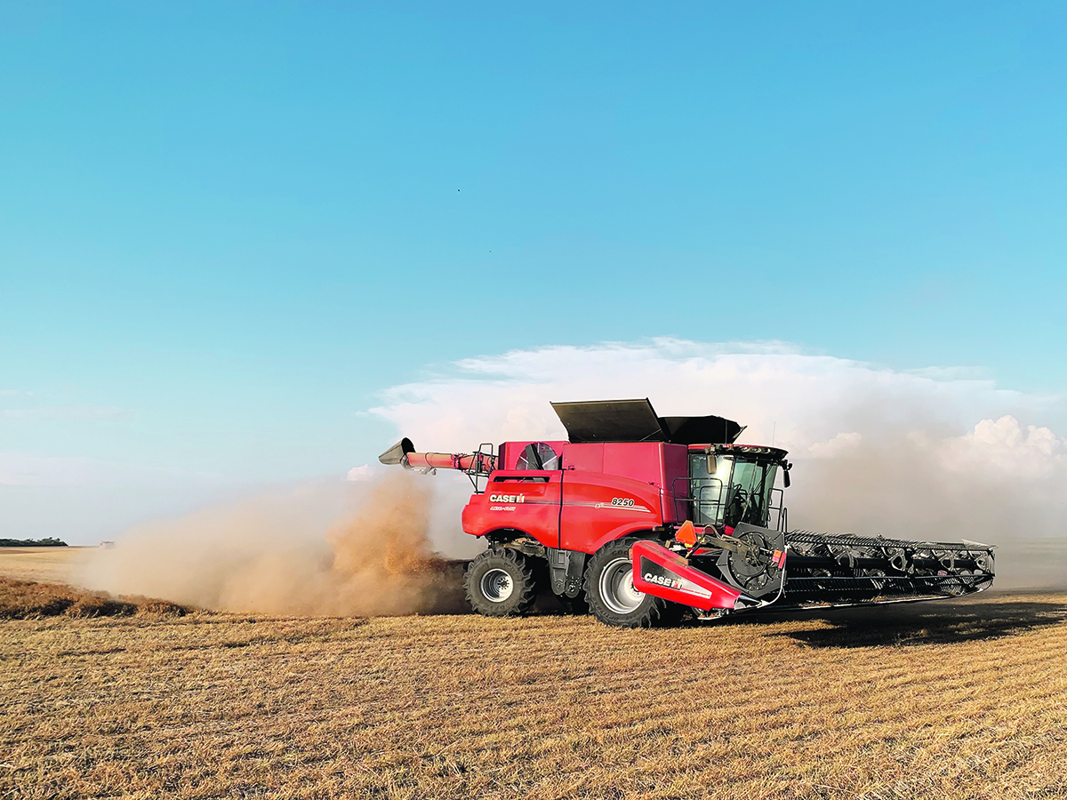 Jason Waldenberger’s combine in action soon after his Seed Terminator was installed in the field. | Photo courtesy of Jason Waldenberger