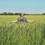 Lukijan Strebchuk stands in a healthy winter triticale crop on his family’s farm, which is making cover cropping work in northwestern Alberta. | Supplied photo