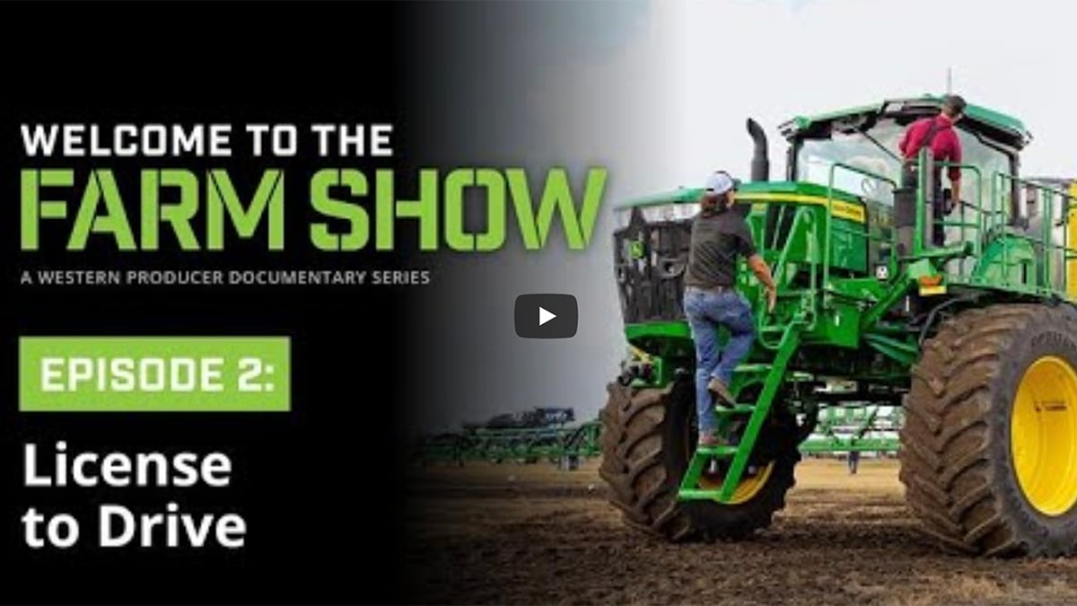 A YouTube screencap of the title screen of the second episode of the "Welcome to the Farm Show" documentary series showing the title, License to Drive, and two people climbing a ladder to get into a massive green tractor.