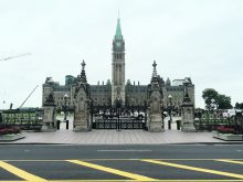 A scenic photo of Parliament Hill in Ottawa.