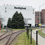The exterior of a Smithfield Foods building showing the company name.