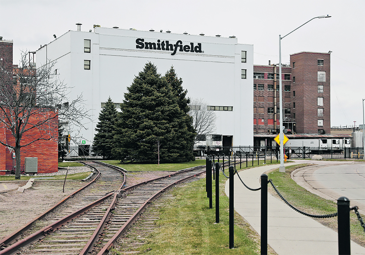 The exterior of a Smithfield Foods building showing the company name.