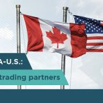 Canadian and American flags fly next to one another, text on the image says, "Canada-U.S.: Largest trading partners."
