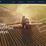 Screencap of the home page of the WestMET Group showing an aerial shot of a tractor with a sprayer applying liquid to a row crop.