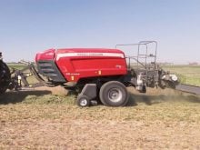 Agco's new SB.1436DB double baler at work in a field.