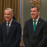 Canada's new Minister of Agriculture, Kody Blois, poses with Prime Minister Mark Carney shortly after being sworn in.