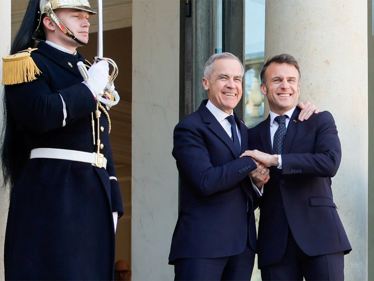 Prime Minister Mark Carney is warmly greeted by French president Emmanuel Macron on his first trip abroad as Canadian Prime Minister.