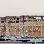 Horse shipping crates sit on the tarmac at Richardson International Airport in Winnipeg.
