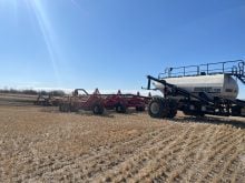 A Bourgault 40-foot SPS360 cultivator applies phosphorus in an agronomy trial.