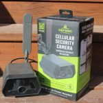 The new Defend camera system from Tactacam sits on a step next to the box it came in.