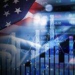A montage including an American flag, stock market graphs, charts and a finger typing on a keyboard.
