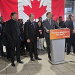 Premier Wab Kinew, with Manitoba Agriculture Minister Ron Kostyshyn (left) and Minister of Municipal and Northern Relations Glen Simard (far left), announce farm support against tariffs at Maple Leaf Foods in Brandon April 2.