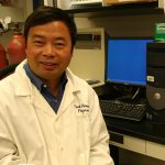 Qiang Liu, a researcher with Agriculture and Agri-food Canada, poses in his lab.