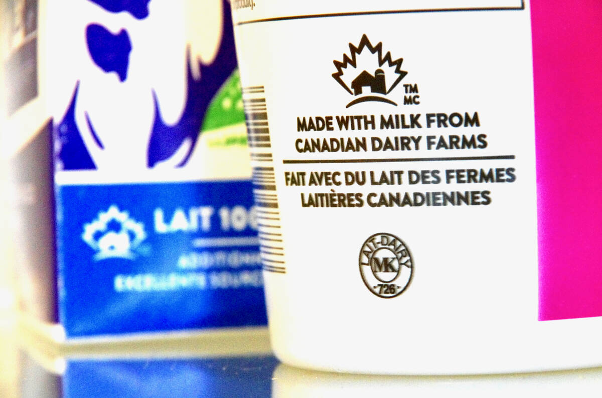 Close-up of a plastic container with "Made with milk from Canadian dairy farms" printed on it.
