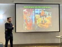 Milan Lukes, who made a presentation at last month’s Giant Pumpkin Growers Seminar, shows photos of himself raising the first prize trophy above his head and atop his giant pumpkin 10 years ago at the Roland Pumpkin Fair.