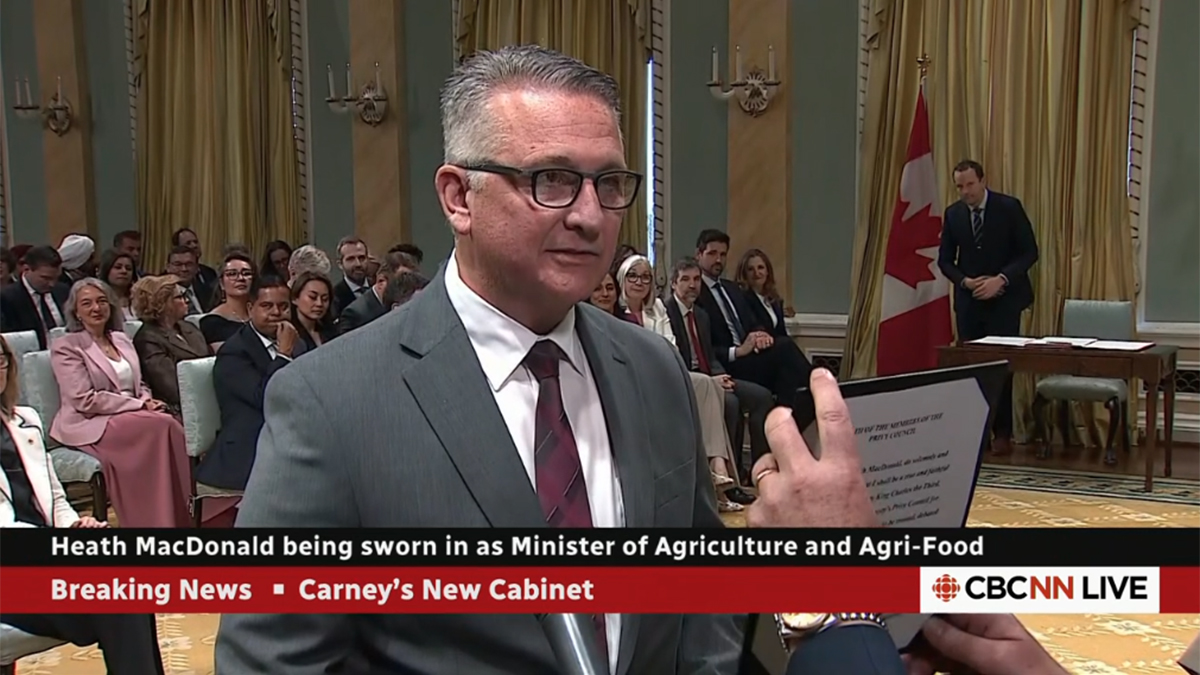 Heath MacDonald is sworn in as the new minister of agriculture and agri-food during a ceremony at Rideau Hall this morning.