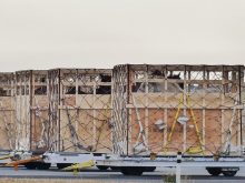 Horse shipping crates sit on the tarmac at Richardson International Airport in Winnipeg.