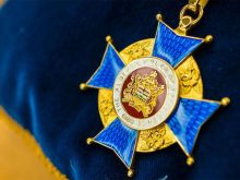 Close-up of the Alberta Order of Excellence medal.