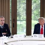 U.S. President Donald Trump and Canadian Prime Minister Mark Carney seated next to one another at a table during the G7 summit in Kananaskis, Alberta, on June 16, 2025.