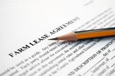 Close-up of a pencil laying on an official document entitled, "Farm Lease Agreement."