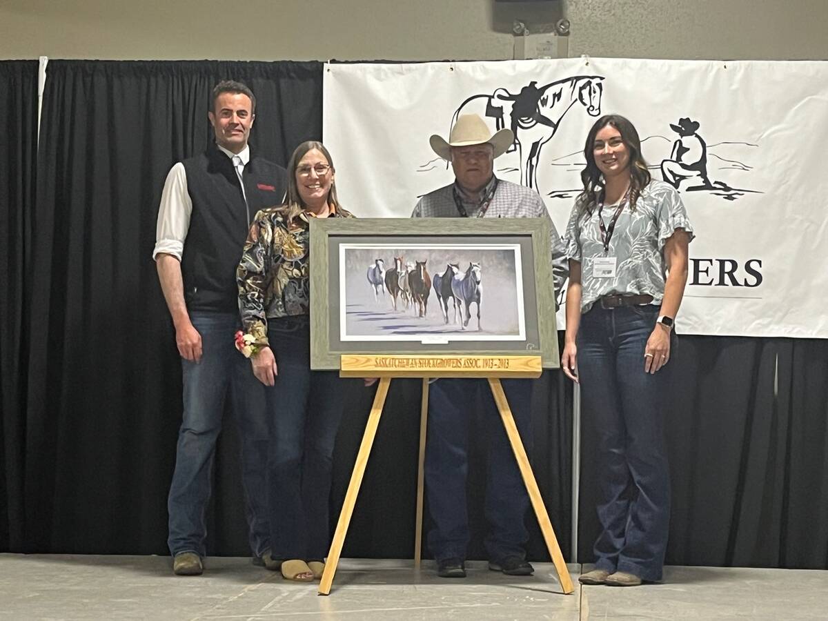 Saskatchewan Stock Growers Association president Jeff Yorga, left, Karin Elford, Mark Alford, Mindy Hockley-Anderson from Saskatchewan Stock Growers Foundation were present when the Alfords were named Saskatchewan’s TESA winners for 2025. Photo: Karen Briere 