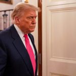 FILE PHOTO: U.S. President Donald Trump walks on the day of a “One Big Beautiful” event at the White House in Washington, DC., U.S., June 26, 2025. REUTERS/Nathan Howard/File Photo