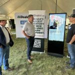 Provincial ag minister Daryl Harrison, Premier Scott Moe and GFM EVP Ryan Green at Ag In Motion 2025.