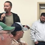 Photo by Greg Price
Chris Siemens (left), president of the Hays Grazing Association, pleaded there are other avenues to increased revenue streams for municpalities like property tax rates for farms relative to acreages as opposed to potentially selling off land leased by generational farmers to special interest groups.