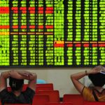 Concerned Chinese investors look at prices of shares (red for price rising and green for price falling) at a stock brokerage house in Jiujiang city, east Chinas Jiangxi province, 8 July 2013.
Chinese stocks tumbled on Monday (8 July 2013) on speculations that the resumed trading of Treasury bond futures and new share offerings will hurt stock prices. The Shanghai Composite Index dropped 48.93 points, or 2.44 percent, to 1,958.27 at the close.No Use China. No Use France.