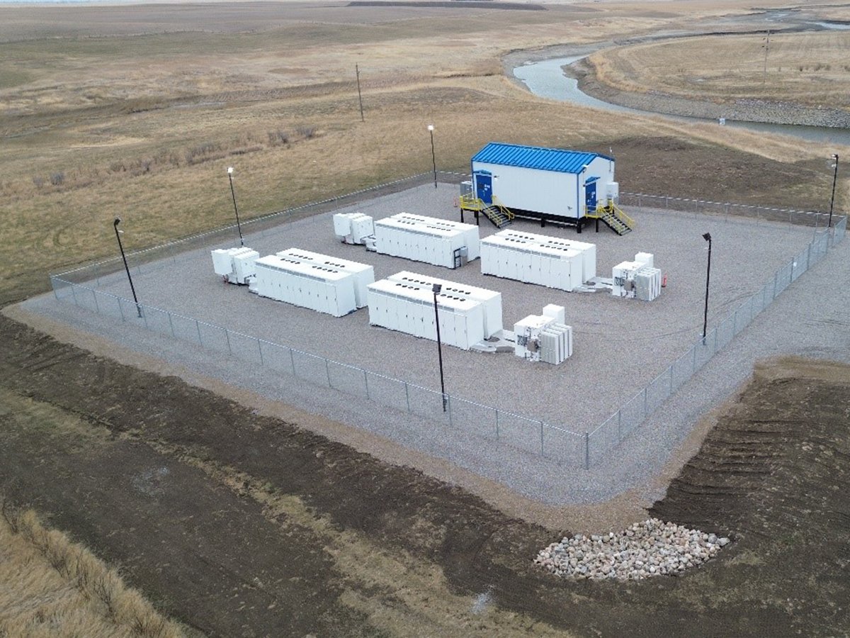 An aerial view of the battery energy storage system (BESS), part of the enhanced Battery and Renewables (eBAR) project near Raymond, Alberta.