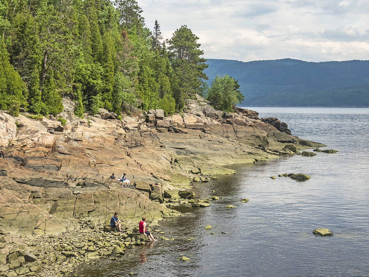 Relaxing on the rocks at low tide in the Saguenay Fjord.