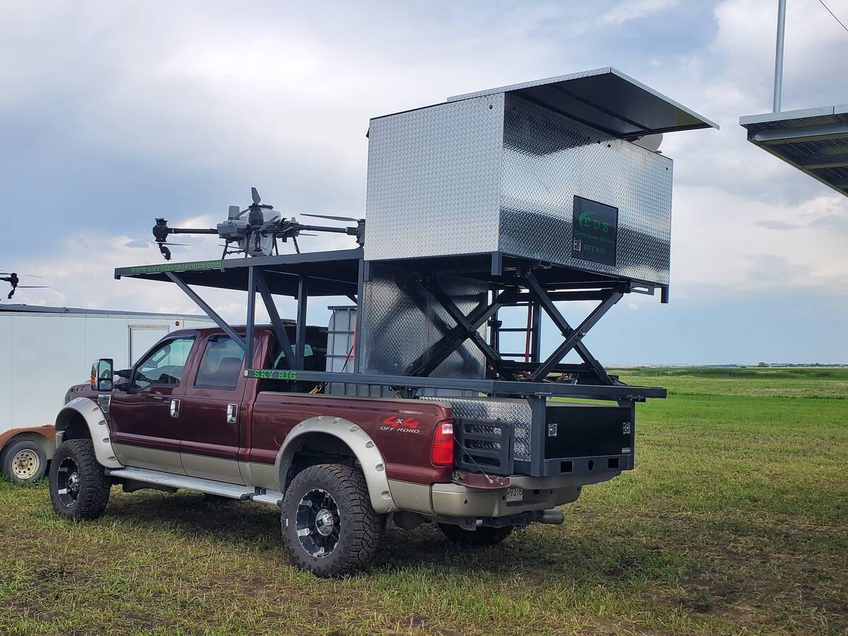 The Sky Rig platform made by Elev8 Drone Service from Creston, B.C., sits in the box of a one-ton truck at the Ag in Motion farm show near Langham, Sask., in July, 2025.