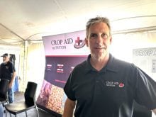 Darren Sander, owner and operator of Crop Aid Nutrition Ltd. at his company's booth at Ag in Motion.