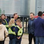 Pierre Poilievere at Sixteen Grains near Saskatoon, Sask. speaking to one of the farm owners.