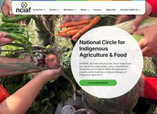 A screen capture of the homepage for the National Circle for Indigenous Agriculture and Food showing a close-up of the hands of people sitting in a circle holding various freshly harvested vegetables.