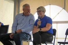 MNP farm transition specialist Trevor Mclean laughs with Cindy Simmons, a financial planner with RBC Dominion Securities during a presentation on farm succession planning at Ag in Motion on July 16, 2025.