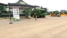 John Deere's machinery display at the Ag in Motion farm show near Langham, Saskatchewan, July 2025.
