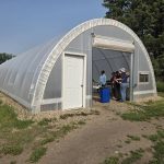 A high tunnel greenhouse at Assiniboine College's North Hill Campus in Brandon , Manitoba.