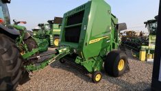 A new John Deere 1 Series baler sits on display at the Ag in Motion farm show near Langham, Saskatchewan in July, 2025.