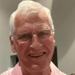 A photo of Sinclair Harrison smiling captured via Facebook.
