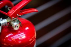 Fire extinguisher detail. Ilbusca/iStock/Getty Images