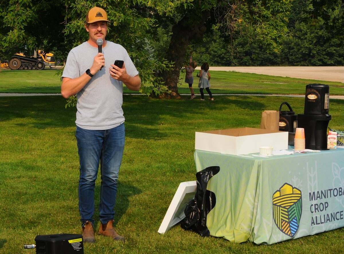 Andrew Doerksen of Beaver Creek Farms welcomes visitors for anOn Farm Research presentation and update. Photo: Gord Leathers