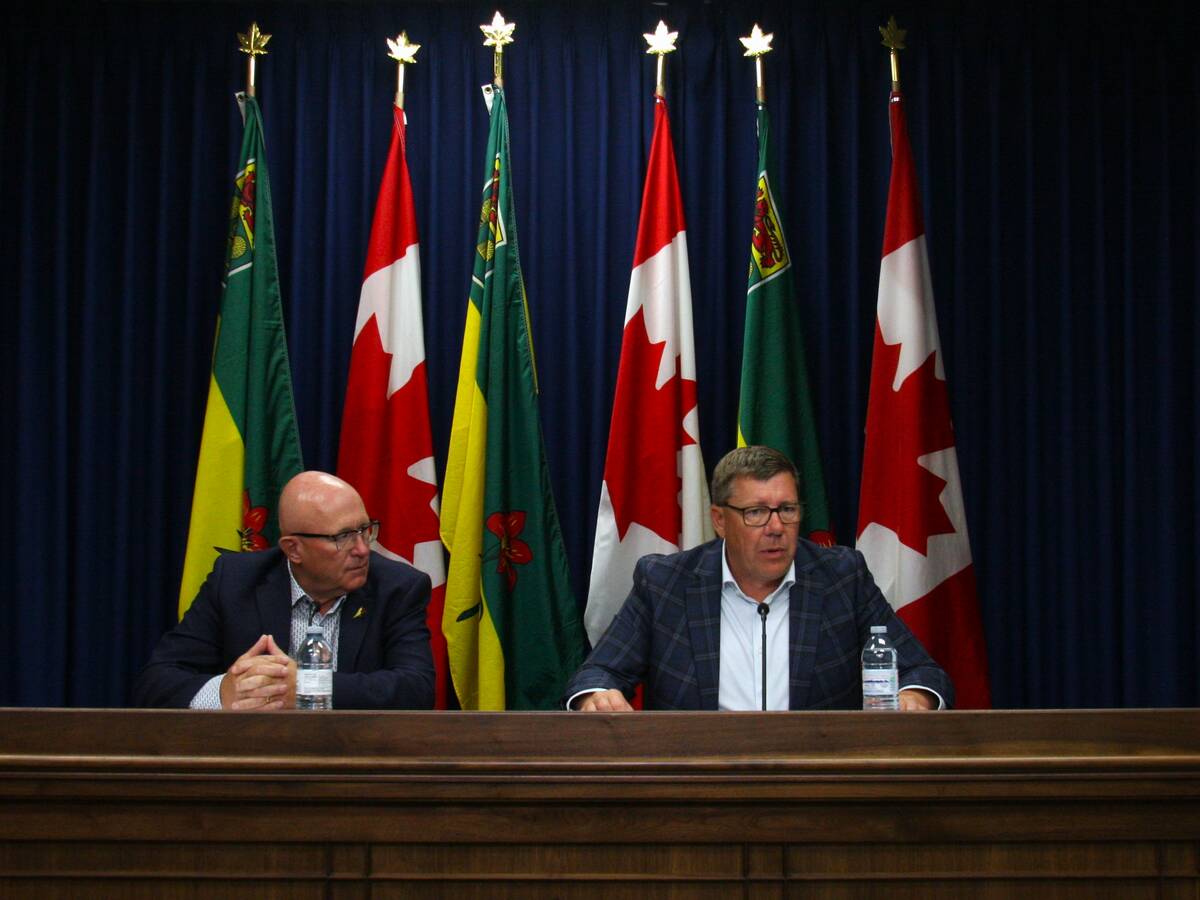 Premier Scott Moe and Minister Warren Kaeding at Saskatoon Cabinet Office press briefing ahead of Asia trade missions.