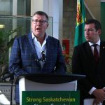 Saskatchewan premier Scott Moe, left, and Kody Blois, parliamentary secretary to the prime minister, participate in a press conference prior to their mission to China.
