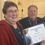 Glacier FarmMedia executive editor Laura Rance displays her Canadian Farm Writers Federation Lifetime Achievement Award.
