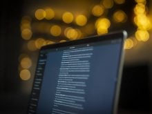 A laptop screen is seen with the OpenAI ChatGPT website active in this photo illustration.