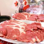 Sliced Canadian beef is displayed on dishes for tasting at the Nissin World Delicatessen supermarket in Tokyo.